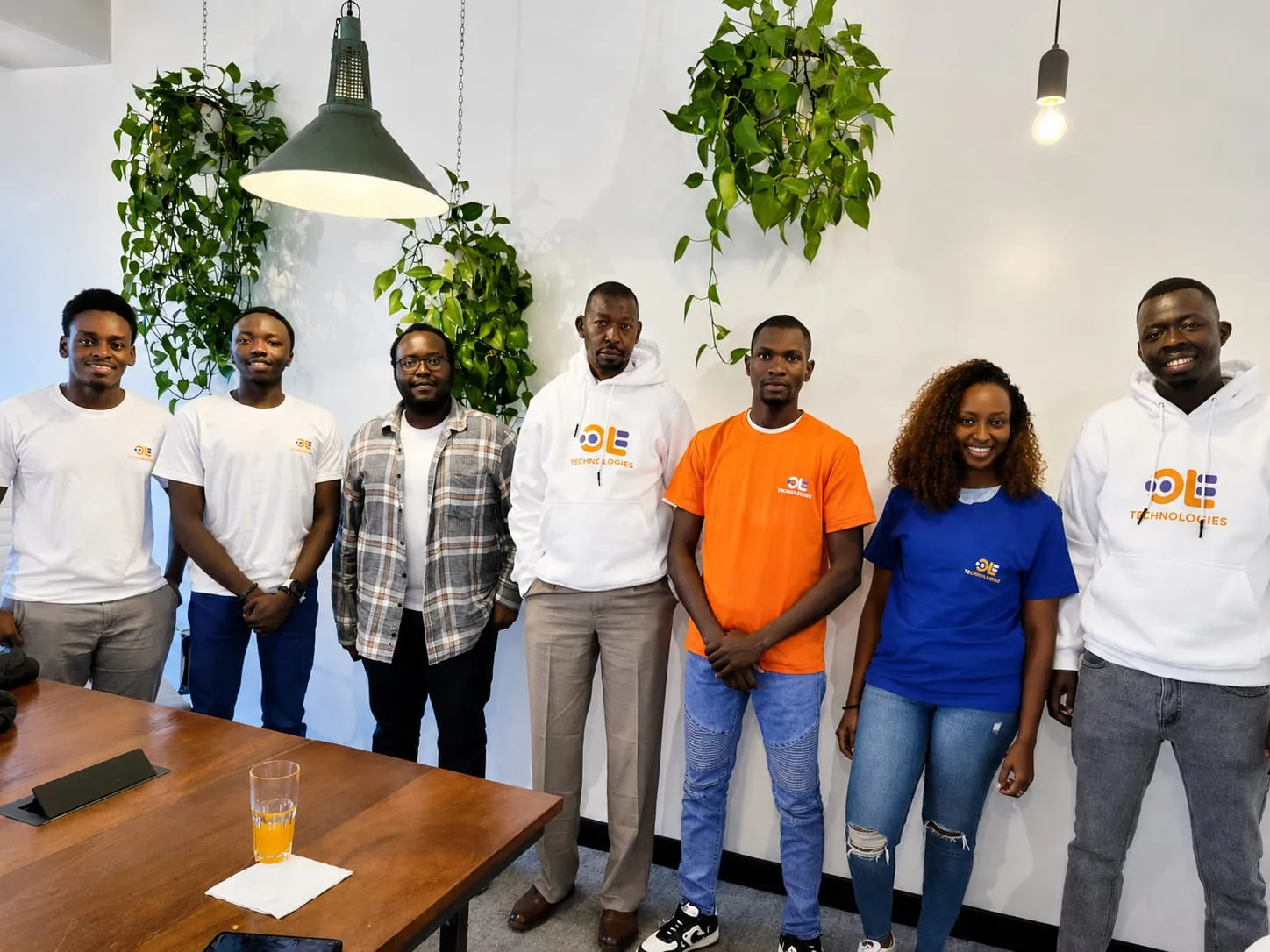 Ole Technologies team gathered together in the office